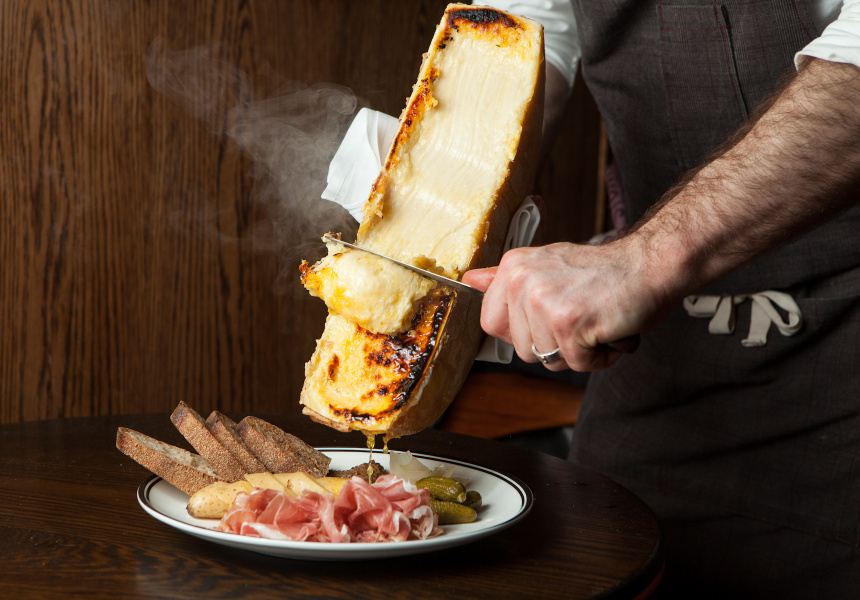 A picture of raclette being served.